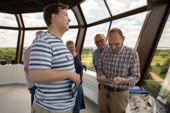 June 2018: After The Tower’s “soft opening” we had lots of visitors. Pictured here is Jonathan Sayers (GCTL Director) and a chap who’s name I’m forgotten but he was an ex-policeman. He’s reading some of his own poetry to Jonathan.